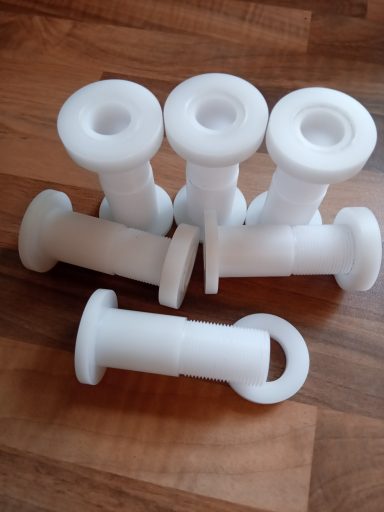 Acetal threaded bushes